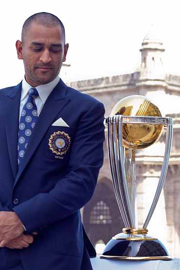 Mahendra Singh Dhoni with the World Cup