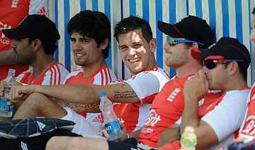 England players take a break during a practice session in Hyderabad