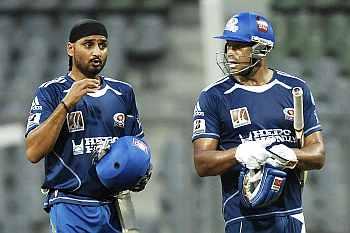 Harbhajan Singh with Andrew Symonds (right)