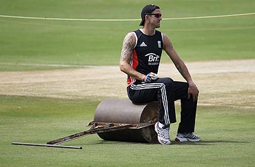 England's Kevin Pietersen sits on a ground roller during a practice session on Thursday