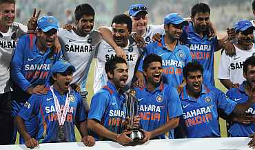 Indian players celebrate after winning the match