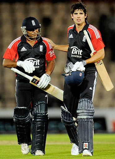 England's captain Alastair Cook (right) and Samit Patel leave the field after England defeated India in the second One-Day International on Tuesday