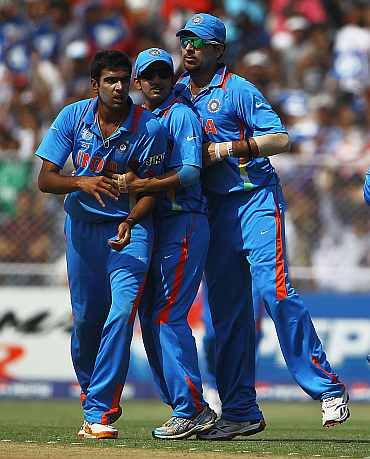 Ashwin celebrates after picking up a wicket