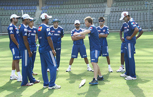 Mumbai Indians fielding coach, Jonty Rhodes, shares his thoughts with the players during a training session
