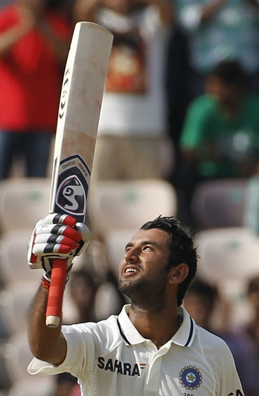 Cheteshwar Pujara celebrates after getting to hundred on Day 1 of the first Test against New Zealand