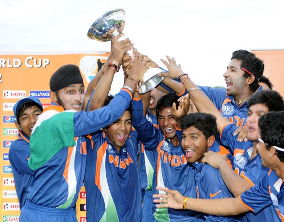 Harmeet Singh (left) celebrates with team-mates