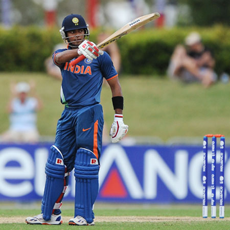 Unmukt Chand celebrates reaching his century during the 2012 ICC U19 Cricket World Cup Final between Australia and India at Tony Ireland Stadium on August 26, 2012 in Townsville, Australia