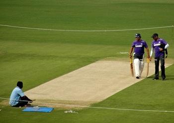 Sachin Tendulkar inspects the pitch at the VA stadium on Tuesday