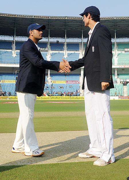 India captain MS Dhoni and England captain Alastair Cook greet each other during the toss, before the start of the 4th Test, on Day 1 at VCA ground in Nagpur on Thursday