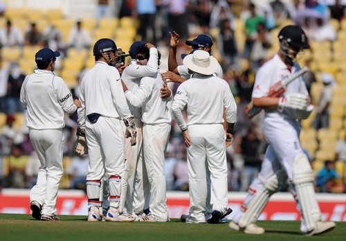 Jadeja is congratulated by teammates after dismissing Trott