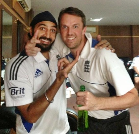 England's Monty Panesar and Greame Swann celebrate in the dressing room after winning the Test series vs India in December 2012