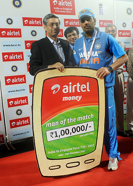 Yuvraj Singh receives the man-of-the-match award on Thursday