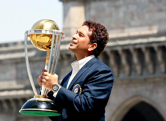 Sachin Tendulkar poses with the 2011 World Cup trophy
