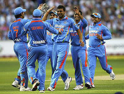 Indian players celebrate a wicket