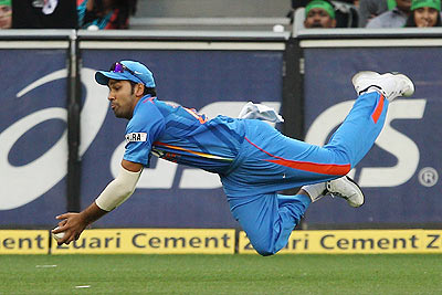 Rohit Sharma drops a catch in the outfield during the 1st ODI on Sunday