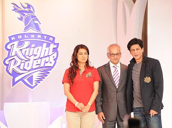 Kolkata Knight Riders owners Shah Rukh Khan, Juhi Chawla and husband Jai Mehta at the unveiling of the new logo in Mumbai on Tuesday