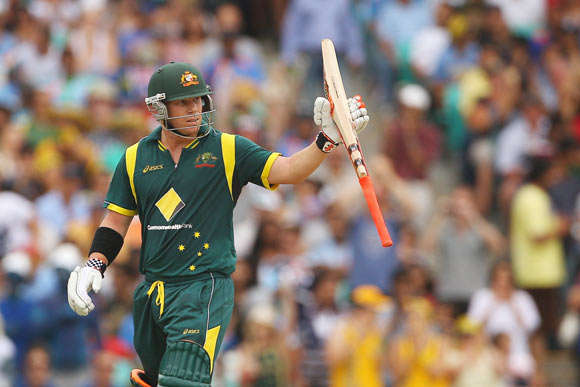 David Warner of Australia reacts after scoring fifty runs during the One Day International match between Australia and India at the Sydney Cricket Ground