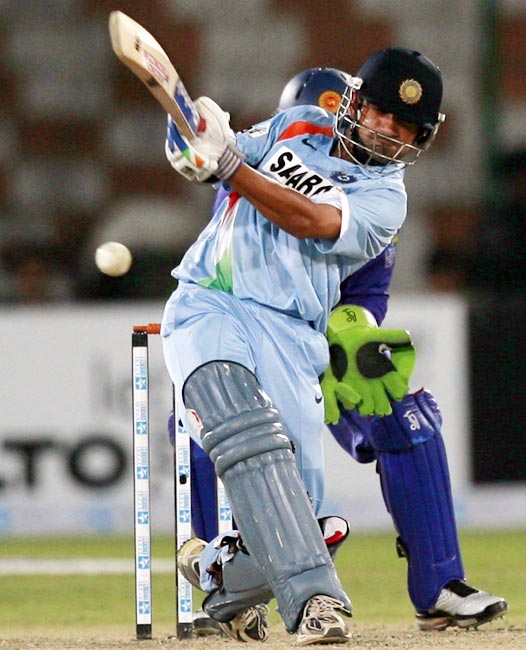 Gautam Gambhir plays a shot against Sri Lanka during the Asia Cup tournament at the National Cricket Stadium in Karachi, on July 3, 2008