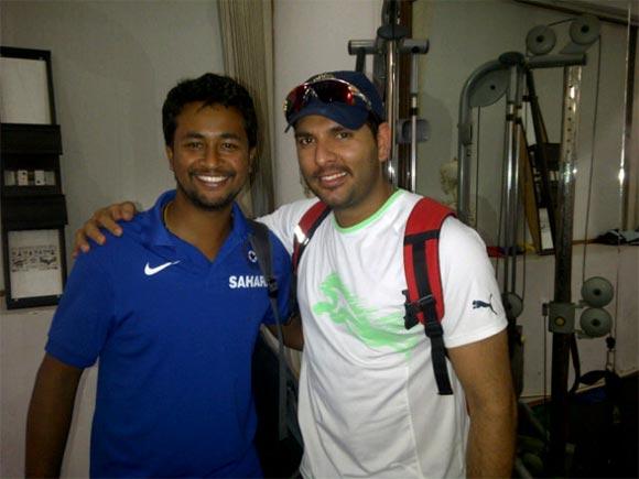 Yuvraj Singh with Pragyan Ojha