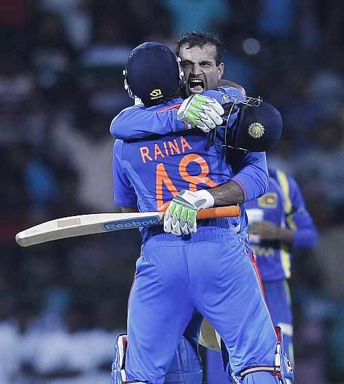 India's Irfan Pathan and Suresh Raina celebrate after winning the third One-Day match against Sri Lanka