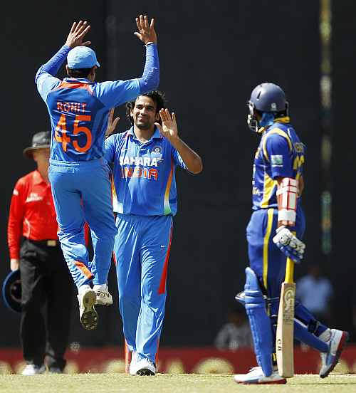 Zaheer Khan celebrates after picking the wicket of Dilshan