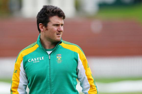 Captain Graeme Smith looks on