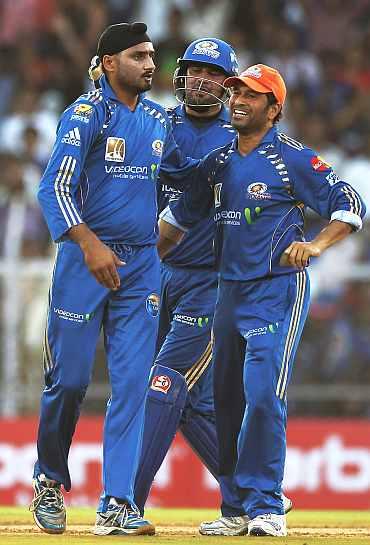 Mumbai Indians' Harbhajan Singh with Sachin Tendulkar