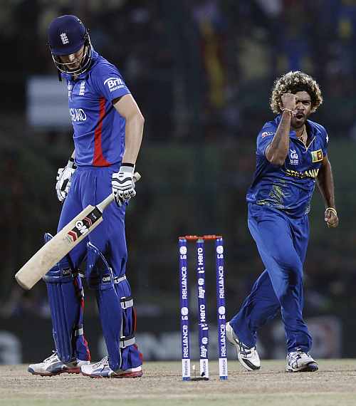 Sri Lanka's Lasith Malinga celebrates taking wicket of England's Alex Hales during their Twenty20 World Cup Super 8 cricket match in Pallekele