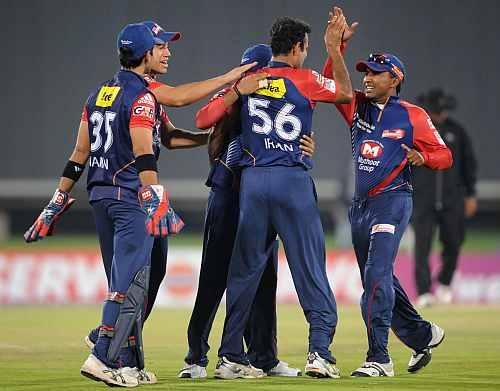 Delhi Daredevils players celebrate after picking up a wicket