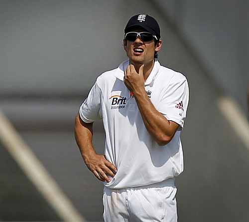 England's captain Alastair Cook gestures during first day of warm-up game against India 'A' cricket team in Mumbai