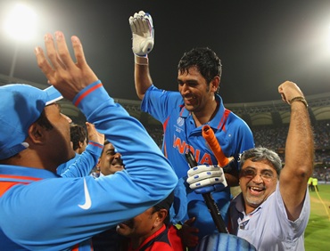 Dhoni is chaired by teammates after India win the 50 overs World Cup in 2011