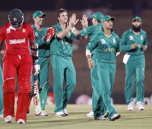 South Africa's Albie Morkel (centre) is congratulated by his teammates