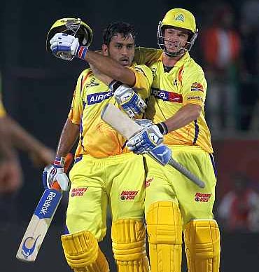 Mahendra Singh Dhoni (left) with Albie Morkel