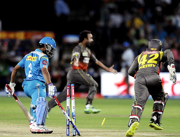 Amit Mishra celebrates as Ashok Dinda is bowled