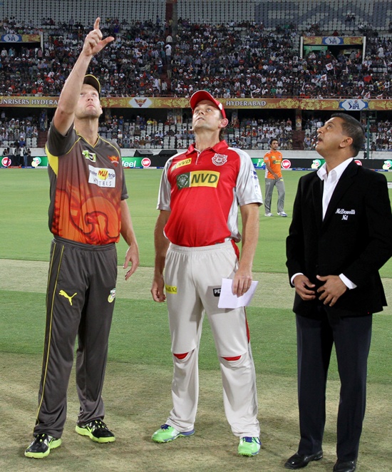 Adam Gilchrist (centre) and Cameron White at the toss
