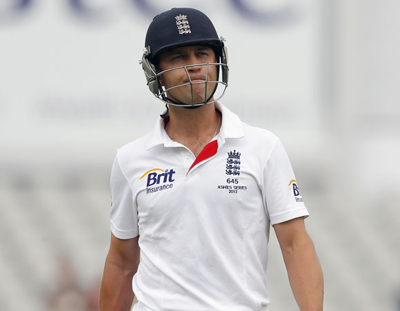 England's Jonathan Trott walks off the pitch after being dismissed on the final day