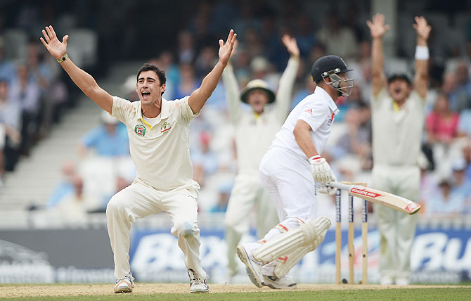 Mitchell Starc of Australia appeals successfully for the wicket of Jonathan Trott on Day 3 of the 5th Ashes Test on Friday