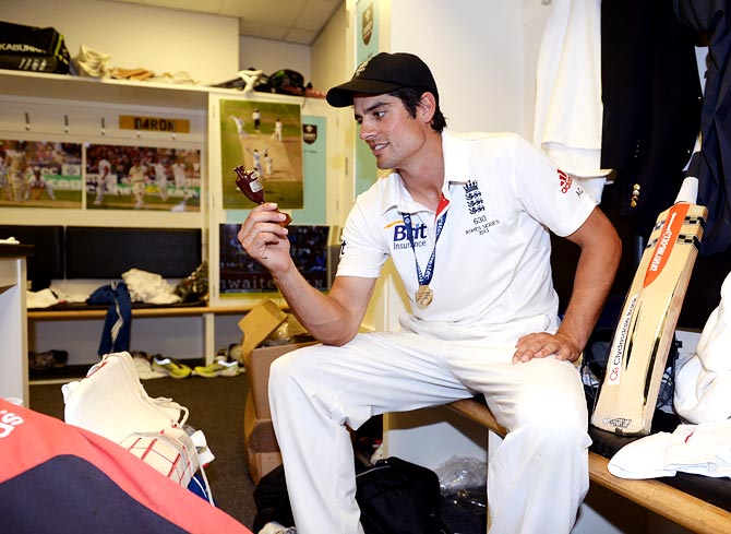 England captain Alastair Cook with the Ashes urn