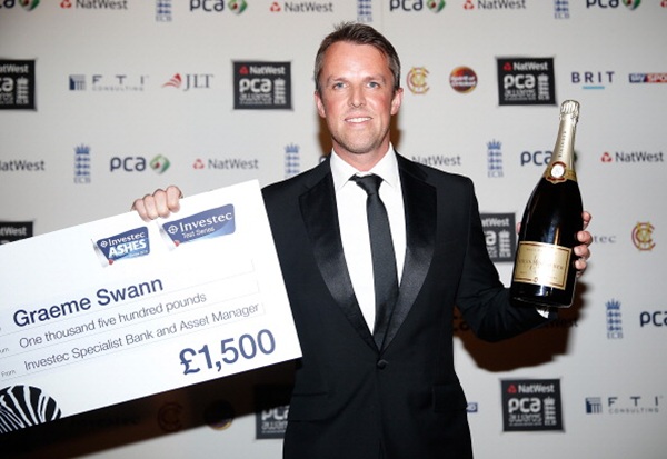 Graeme Swann poses with the Investec Test Player of the Summer Award during the Natwest PCA Awards dinner at The Roundhouse on October 3, 2013 in London