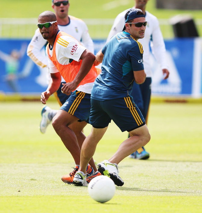 Vernon Philander and Dean Elgar (right) of South Africa during the South African national cricket team training session