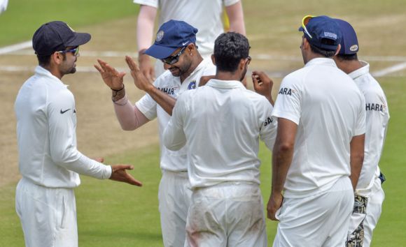 Indian players celebrate after dismissing AB de Villiers
