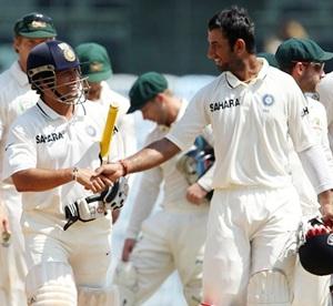 Tendulkar and Pujara greet each ohter after India's victory