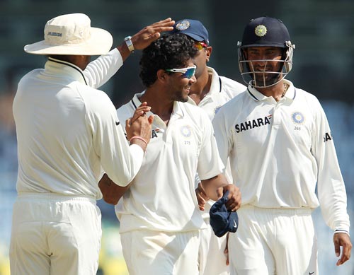 Indian players celebrate a wicket during the first Test in Chennai
