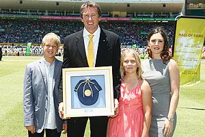 McGrath poses with his family after bein inducted into ICC Hall of Fame