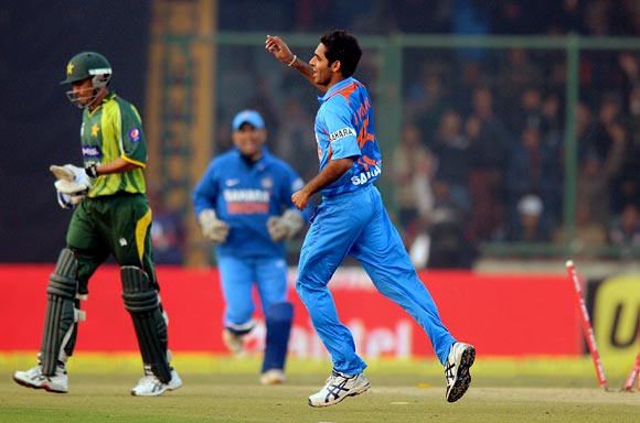 Bhuvneshwar Kumar is jubilant after taking the wicket of Younis Khan