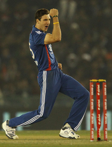 Steve Finn of England celebrates the wicket of Rohit Sharma of India during the 4th ODI in Mohali