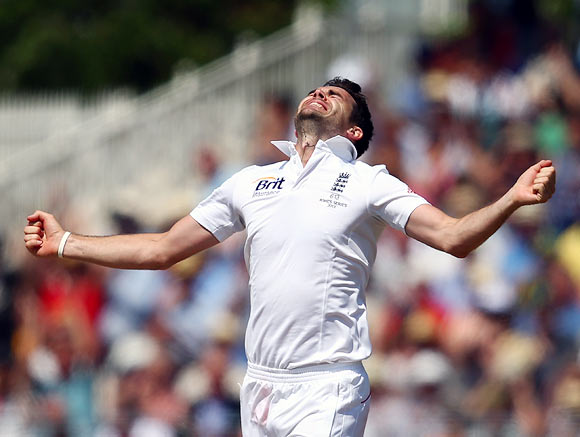 James Anderson celebrates after taking the wicket of Mitchell Starc