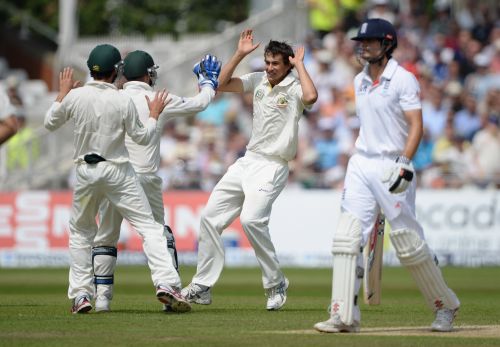 Ashton Agar celebrates after claiming the wicket of Alastair Cook