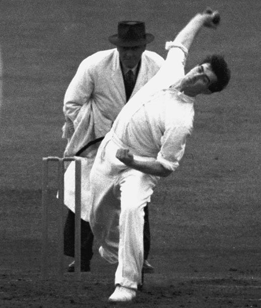England's Fred Trueman bowls against India during the third Test match at Old Trafford in Manchester on July 17-19, 1952