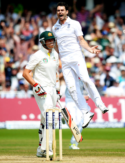 James Anderson celebrates as Peter Siddle walks back after his dismissal